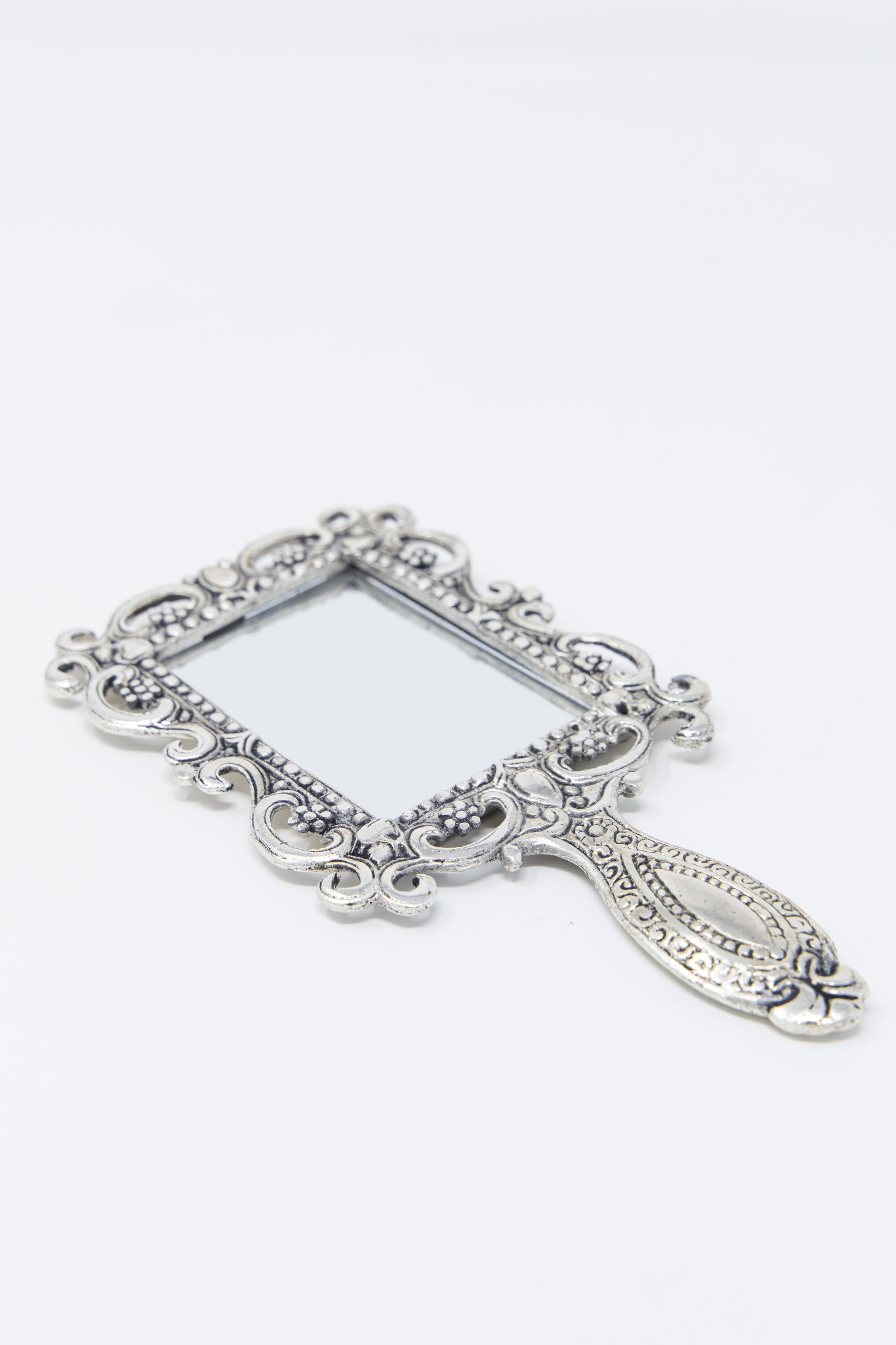AMULYA’s Regal Reflections Metal Hand Mirror